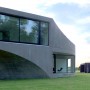 Unique Shape of a Concrete House with Modern Interior Design in Argentina - Entrance