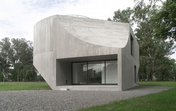 Unique Shape of a Concrete House with Modern Interior Design in Argentina - Facade