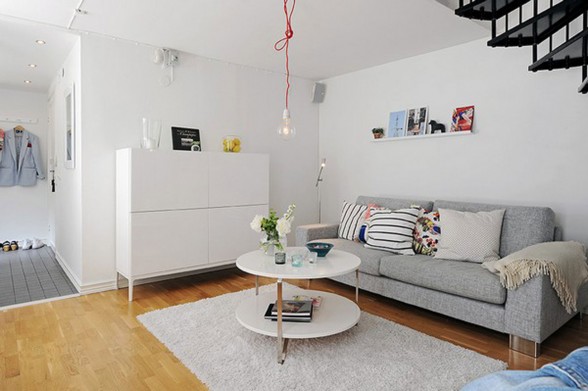 Elegant White Interior Design of a Minimalist Duplex Apartment Plans - Grey Couch