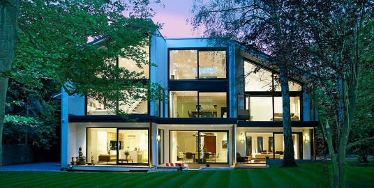 energy efficient homes plan with large glass wall