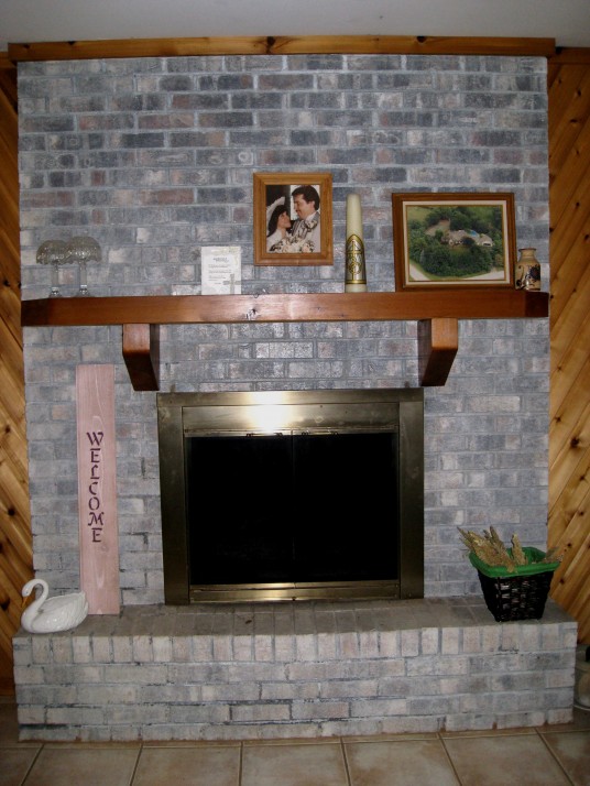 Fireplace Before Makeover with Brick and Metal