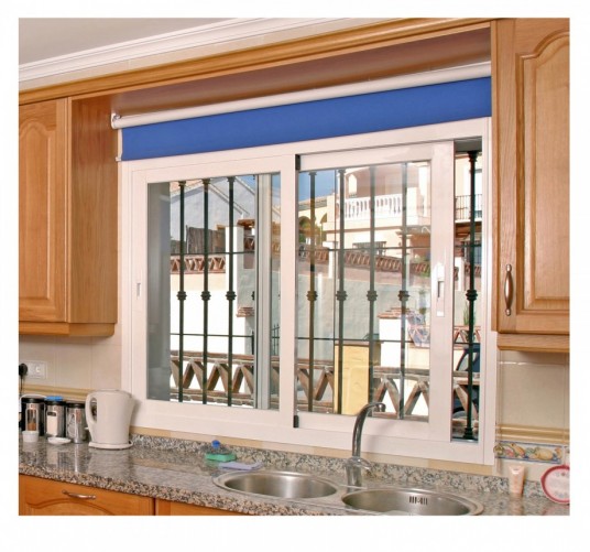 Kitchen Window Slide and Curtain Over Sink