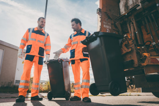 Garbage removal men working for a public utility